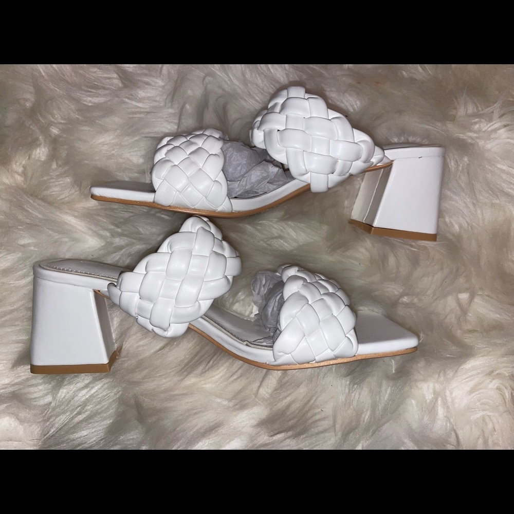 White mid size heels with two braided straps